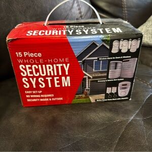 New in box whole home security system